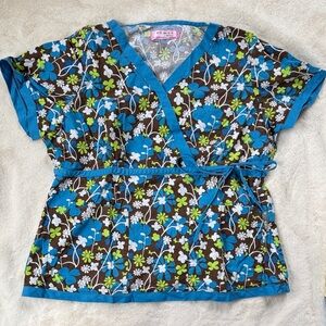 Floral Faux Wrap Scrub Top with Blue Trim